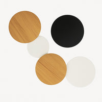 Applique murale LED ronde effet lune en noir · 20 cm